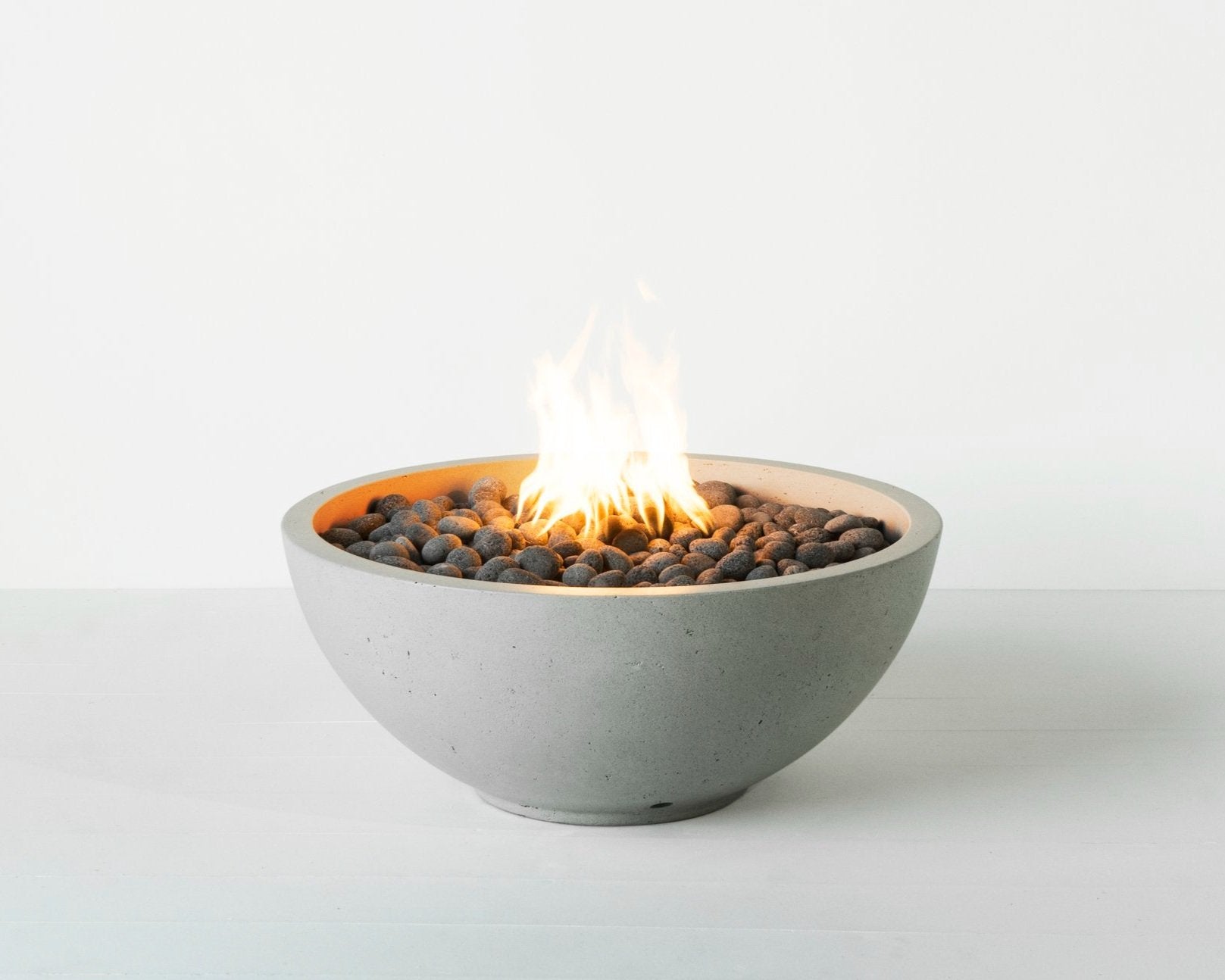 Toba Agudo concrete round fire pit by Wetstone Design